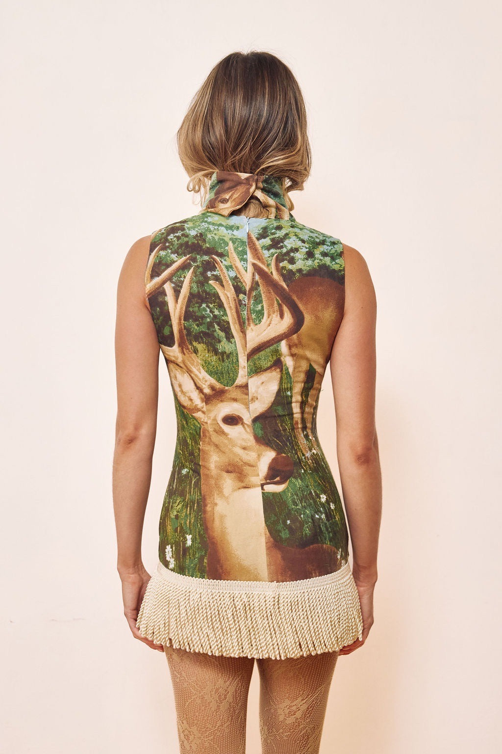 turtle mock neck mini dress with large deer in pasture print fringe hem